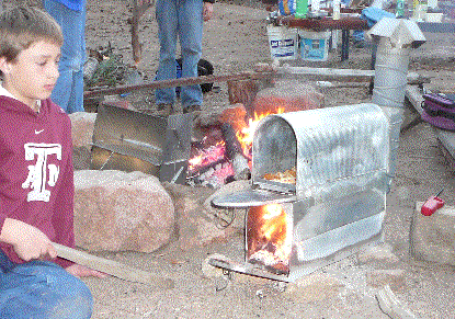 Baking in a Mailbox Oven (bottom one for fire, top one is oven)